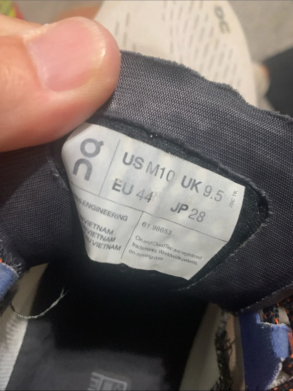 On Running Men's Cloudmonster Sneakers in White with Blue and Orange Accents